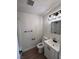 This bathroom boasts a shower, vanity, and modern lighting offering both style and practicality at 5920 Glen Eagles Ln, Las Vegas, NV 89108