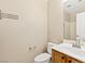 Simple bathroom with a toilet, vanity, and shower at 6013 Jubilee Gardens Ave, Las Vegas, NV 89131
