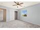 Cozy bedroom with soft carpet, closet, and natural light, creating a serene and inviting space at 6013 Jubilee Gardens Ave, Las Vegas, NV 89131