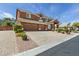 A beautiful home with an ample brick driveway and a well-maintained three-car garage at 6013 Jubilee Gardens Ave, Las Vegas, NV 89131