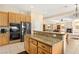 Lovely kitchen featuring stainless steel appliances, granite countertops, and a breakfast bar at 6013 Jubilee Gardens Ave, Las Vegas, NV 89131