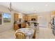 Lovely kitchen with tile floors, stainless steel appliances, and a breakfast bar at 6013 Jubilee Gardens Ave, Las Vegas, NV 89131