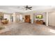 Open-concept living area featuring a breakfast nook, kitchen access, and ample space for gatherings at 6013 Jubilee Gardens Ave, Las Vegas, NV 89131