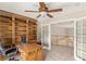Office space with built in shelving and French doors that lead to a loft area at 6013 Jubilee Gardens Ave, Las Vegas, NV 89131