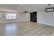 Open living room with recessed lighting, fireplace and wood-look flooring at 6100 Fawn Cir, Las Vegas, NV 89107