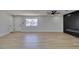Open living room with a modern fireplace and neutral tones, showing the entrance at 6100 Fawn Cir, Las Vegas, NV 89107