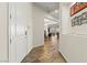 Bright entryway with wood floors, leading to the open-concept living spaces at 6980 W Meranto Ave, Las Vegas, NV 89178