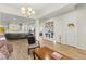 Open-concept living area with tile flooring and views into other rooms at 6980 W Meranto Ave, Las Vegas, NV 89178