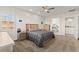 Spacious main bedroom with plush carpet, ensuite bathroom, and walk-in closet at 6980 W Meranto Ave, Las Vegas, NV 89178