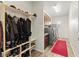 Functional mudroom with ample storage, and laundry machines at 6980 W Meranto Ave, Las Vegas, NV 89178