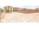 Large and open backyard with a block wall, ready for landscaping and creating your outdoor oasis at 7045 Judith River St, North Las Vegas, NV 89084