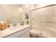Bathroom featuring a glass shower, neutral decor, vanity, and tile flooring at 7045 Judith River St, North Las Vegas, NV 89084