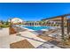 Resort-style community pool with ample lounge seating for relaxation and enjoyment at 7045 Judith River St, North Las Vegas, NV 89084