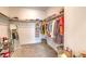 Spacious walk-in closet with ample storage and well-organized shelving and clothes racks at 7045 Judith River St, North Las Vegas, NV 89084