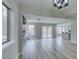 Living room showcasing an electric fireplace and sliding glass doors to the pool and backyard at 71 Sea Holly Way, Henderson, NV 89074