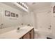 Bathroom featuring a bathtub, shower, and vanity at 735 Wolf Point St, Henderson, NV 89002