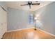 Clean bedroom with wood-look flooring, and a window at 735 Wolf Point St, Henderson, NV 89002