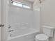 Clean bathroom featuring a tiled shower/tub combination and a practical layout for everyday use at 7820 Milkweed Ct, Las Vegas, NV 89149