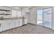 Updated kitchen with stainless steel appliances, and a sliding glass door to the backyard at 7820 Milkweed Ct, Las Vegas, NV 89149