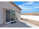 View of the patio and adjacent gravel area, offering a versatile outdoor space at 7820 Milkweed Ct, Las Vegas, NV 89149