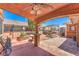 Backyard featuring outdoor kitchen and seating area at 7959 Palace Monaco Ave, Las Vegas, NV 89117