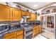 Well-appointed kitchen featuring stainless steel appliances, granite counters, and ample cabinet space at 7959 Palace Monaco Ave, Las Vegas, NV 89117