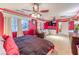 Spacious main bedroom with sitting area, ceiling fans, and neutral carpet at 7959 Palace Monaco Ave, Las Vegas, NV 89117