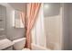 Bathroom with tile and tub/shower combo with a pink curtain at 8 Via Dolcetto, Henderson, NV 89011