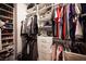 Walk-in closet with built-in shelving for clothes and accessories at 8 Via Dolcetto, Henderson, NV 89011