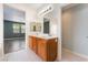 Dual sink bathroom vanity with updated fixtures and bright lighting at 908 Cypress Gold Ct, North Las Vegas, NV 89031