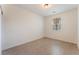 Guest bedroom includes natural light and sleek, wood-look floors at 908 Cypress Gold Ct, North Las Vegas, NV 89031