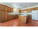 Well-appointed kitchen featuring ample cabinetry, stainless steel appliances, and a functional island at 908 Cypress Gold Ct, North Las Vegas, NV 89031