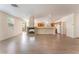 Open-concept living area boasts sleek floors and a cozy fireplace feature at 908 Cypress Gold Ct, North Las Vegas, NV 89031