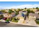 Bird's-eye view of a charming home, solar panels, a well-kept yard, and a friendly neighborhood at 922 Lloyd George Dr, Henderson, NV 89052