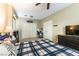 Cozy bedroom with a plaid comforter, dark wood dresser, and closet for extra storage at 922 Lloyd George Dr, Henderson, NV 89052
