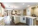 Open kitchen offering modern appliances, lots of cabinets, and seamless flow into the living spaces at 922 Lloyd George Dr, Henderson, NV 89052