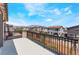 Balcony overlooking neighborhood with walking path and play equipment, with views of surrounding homes at 9314 Observatory St, Las Vegas, NV 89143