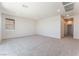 Spacious bedroom with plush carpeting and ample natural light at 9314 Observatory St, Las Vegas, NV 89143