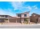 Charming two-story home featuring desert landscaping and a convenient three-car garage at 9314 Observatory St, Las Vegas, NV 89143