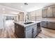 Stylish kitchen island featuring modern fixtures, and open floor plan at 9314 Observatory St, Las Vegas, NV 89143