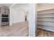 Gourmet kitchen with stainless steel appliances and a spacious walk-in pantry at 9314 Observatory St, Las Vegas, NV 89143