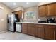 Eat-in kitchen featuring stainless steel appliances and spacious countertops at 9393 New Utrecht St, Las Vegas, NV 89178