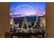 Captivating balcony view of the High Roller Observation Wheel against a colorful sky at 1 Hughes Center Dr # 1901, Las Vegas, NV 89169