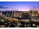 Stunning Las Vegas skyline view at dusk, showcasing the Ferris wheel and hotels against a colorful sky at 1 Hughes Center Dr # 1901, Las Vegas, NV 89169