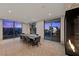 Stylish dining area with views of the city skyline at dusk at 1 Hughes Center Dr # 1901, Las Vegas, NV 89169
