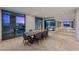 Spacious dining area with city views, adjacent fireplace and balcony access at 1 Hughes Center Dr # 1901, Las Vegas, NV 89169