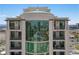 Close up of top floors of modern high-rise featuring private balconies with scenic views at 1 Hughes Center Dr # 1901, Las Vegas, NV 89169