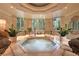 Relaxing hot tub area with stylish plants, surrounded by luxurious decor and natural light at 1 Hughes Center Dr # 1901, Las Vegas, NV 89169