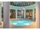 Beautiful hot tub area featuring an artistic pergola, situated next to the sparkling pool at 1 Hughes Center Dr # 1901, Las Vegas, NV 89169