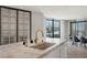 Elegant kitchen featuring a stone countertop, modern fixtures, and a beautiful view of the city at 1 Hughes Center Dr # 1901, Las Vegas, NV 89169